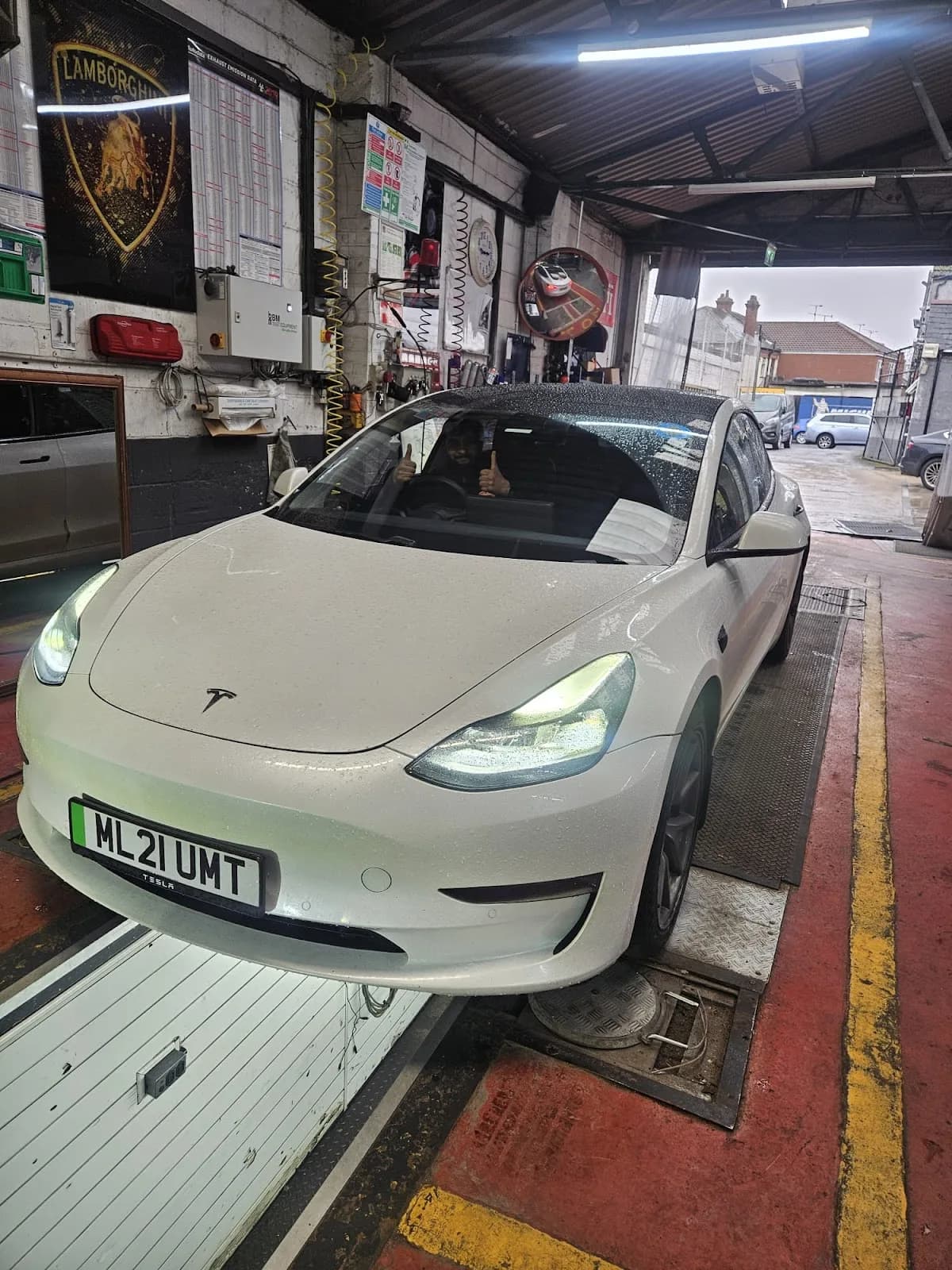 A car being checked over by a technician at Bismillah Garage Luton