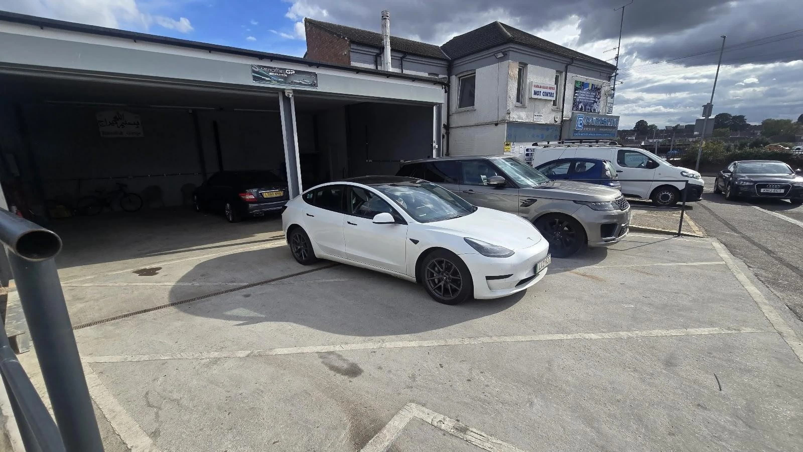 Vehicles parked outside the Bismillah Garage Luton premises